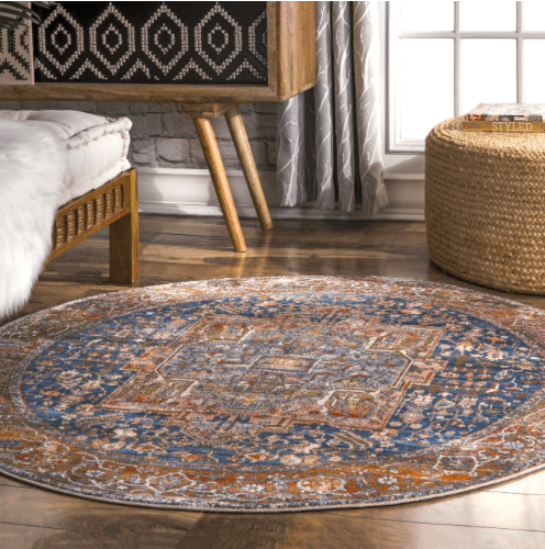 http://cdn.apartmenttherapy.info/image/upload/v1651159965/at/style/2022-04/Round%20Rugs%20Trend/ethel_medallion_rug_credit_to_home_depot.png