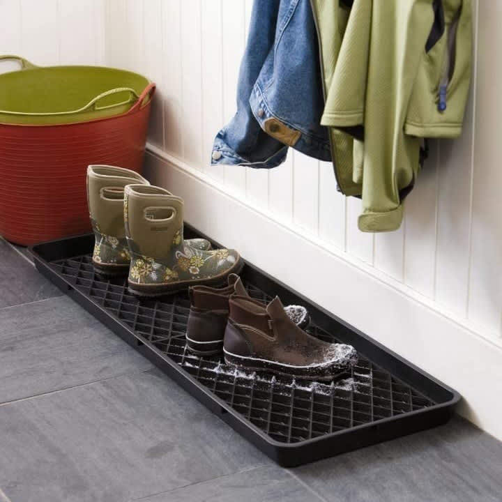 http://cdn.apartmenttherapy.info/image/upload/v1669741701/gen-workflow/product-database/gardeners-supply-company-large-boot-tray-with-drip-grid-amazon.jpg