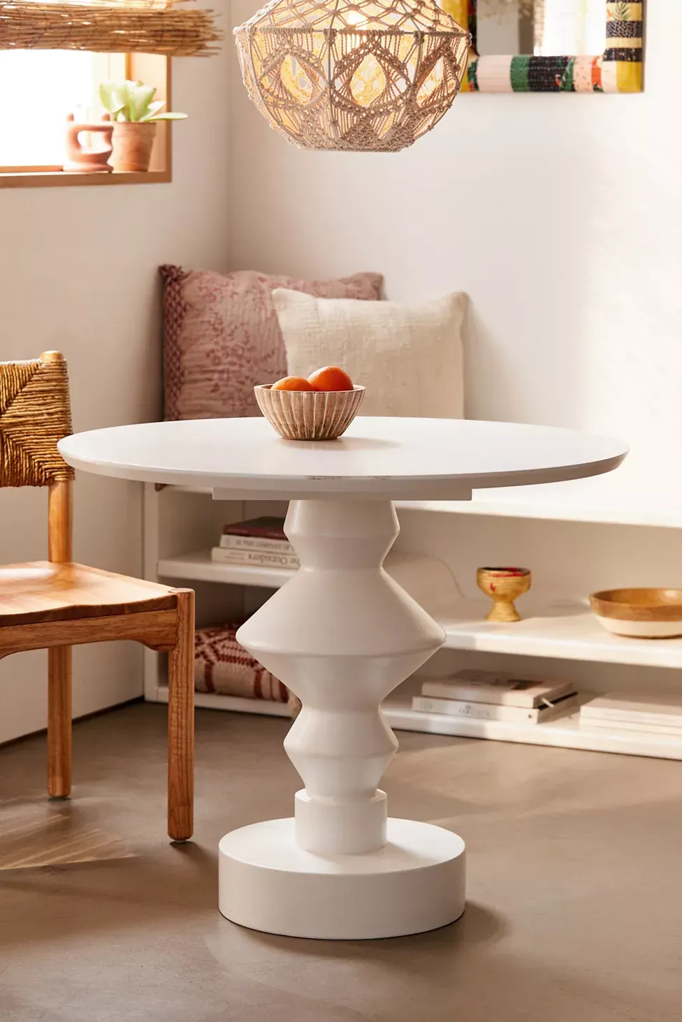 http://cdn.apartmenttherapy.info/image/upload/v1689605184/gen-workflow/product-database/urban-outfitters-vera-pedestal-table.webp