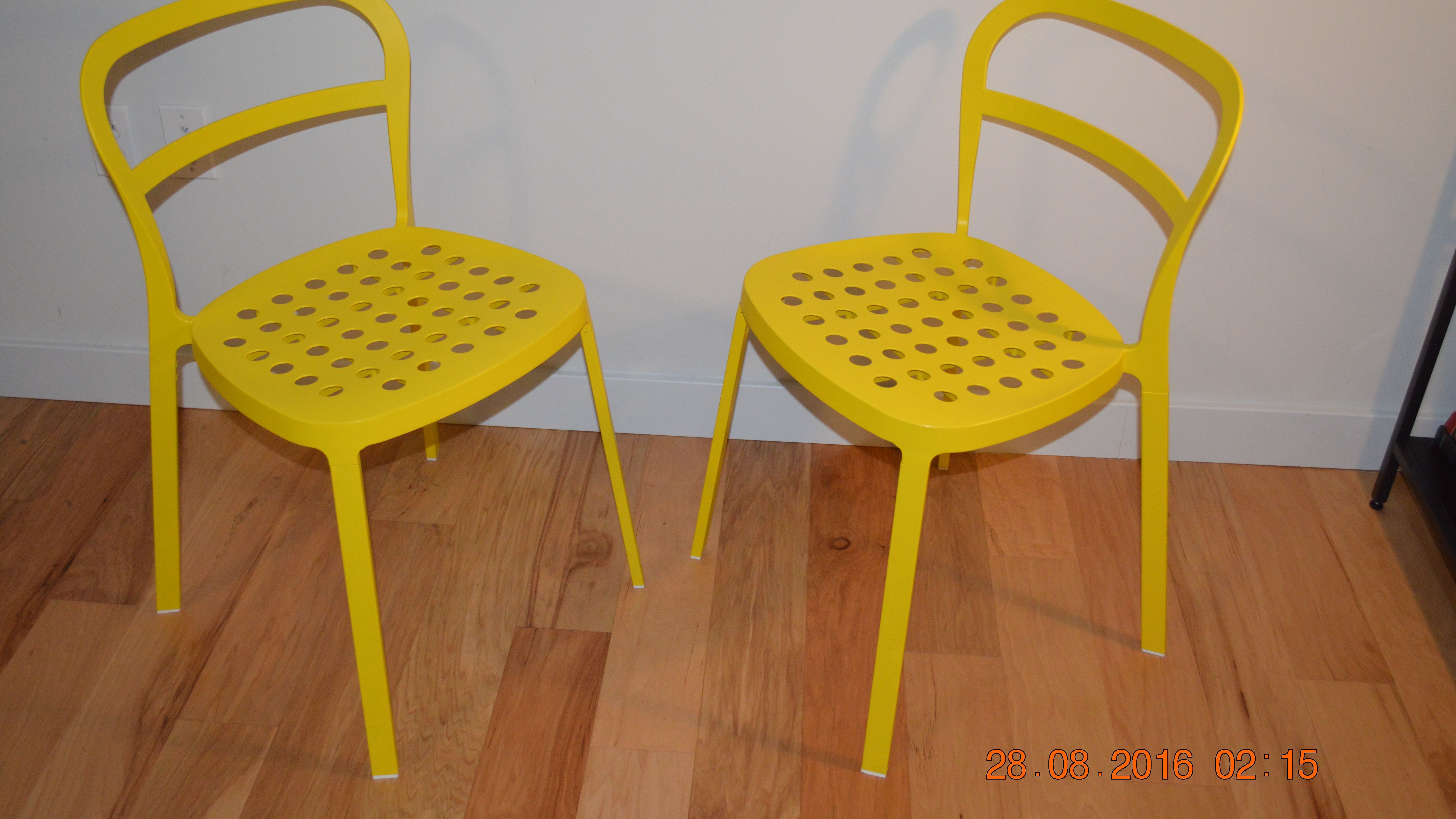 pair of ikea reidar chairs  yellow