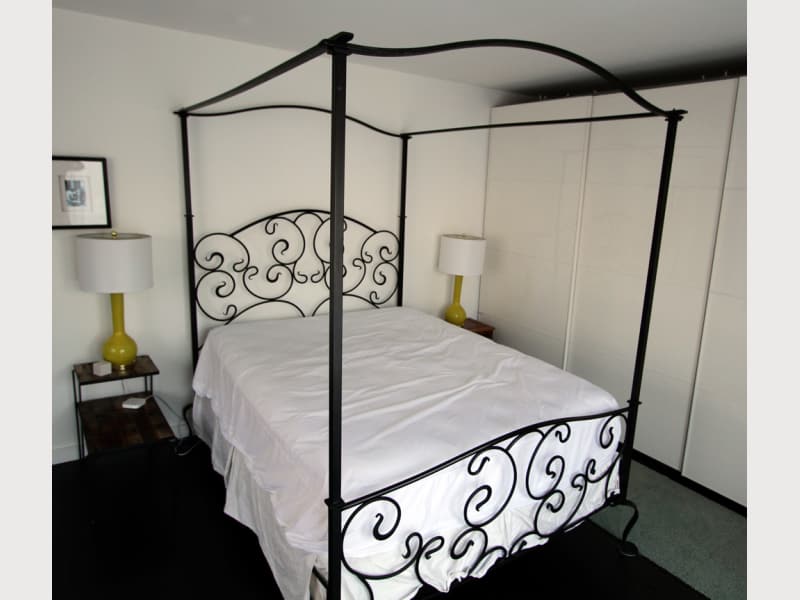 Wrought iron four poster bed deals