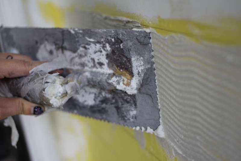 How To Tile Your Bathroom Shower Like a Pro | Apartment ...