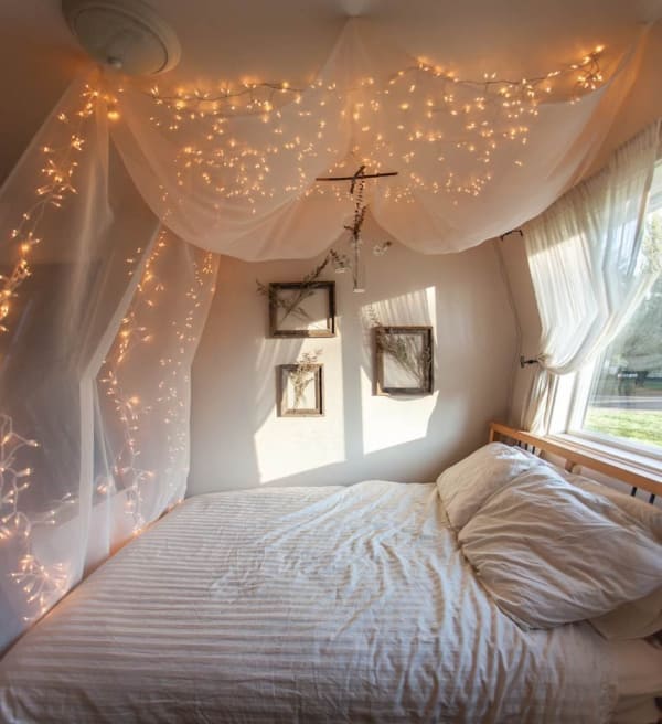 Nine Creative Ways to Use String Lights in the Bedroom Apartment Therapy