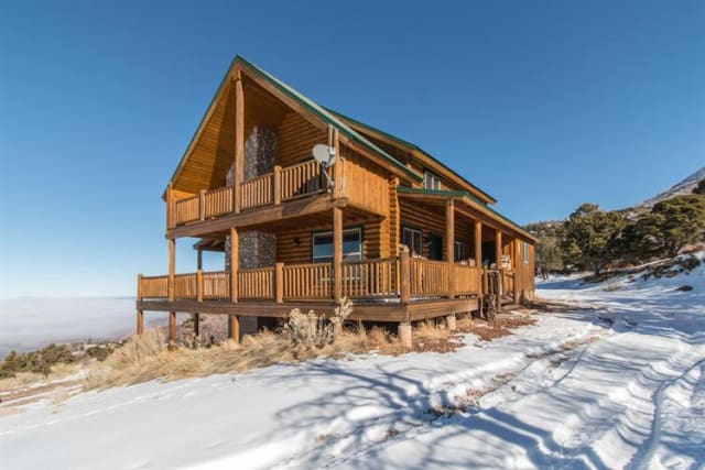 7 Cozy Snowy Cabins For Sale For 400k Or Less
