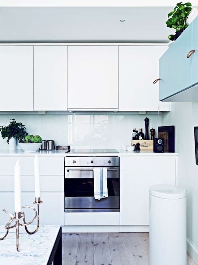 Frosted glass backsplash in kitchen