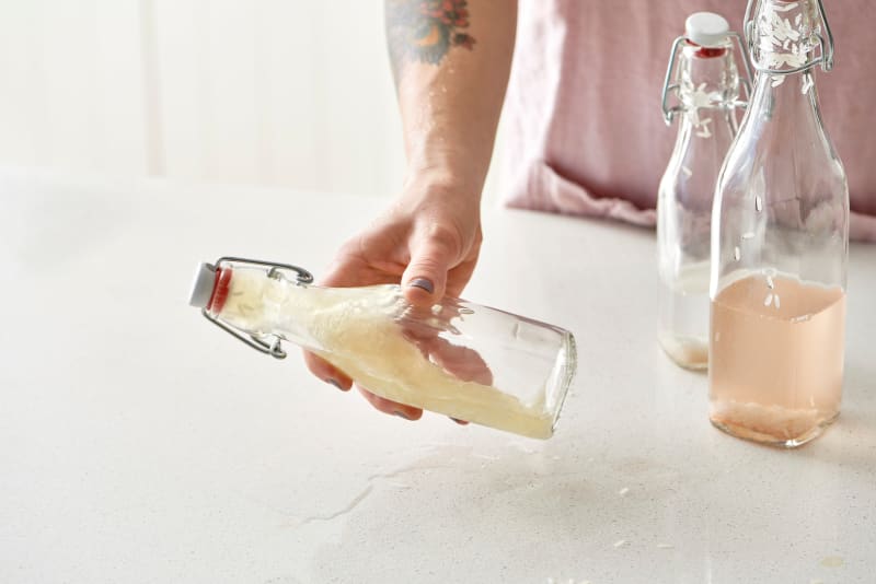 The Trick Bartenders Use to Clean Out Glass Bottles Kitchn