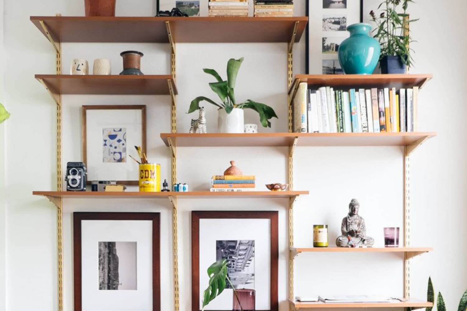 8 Spaces that Make Track Shelving Look Good