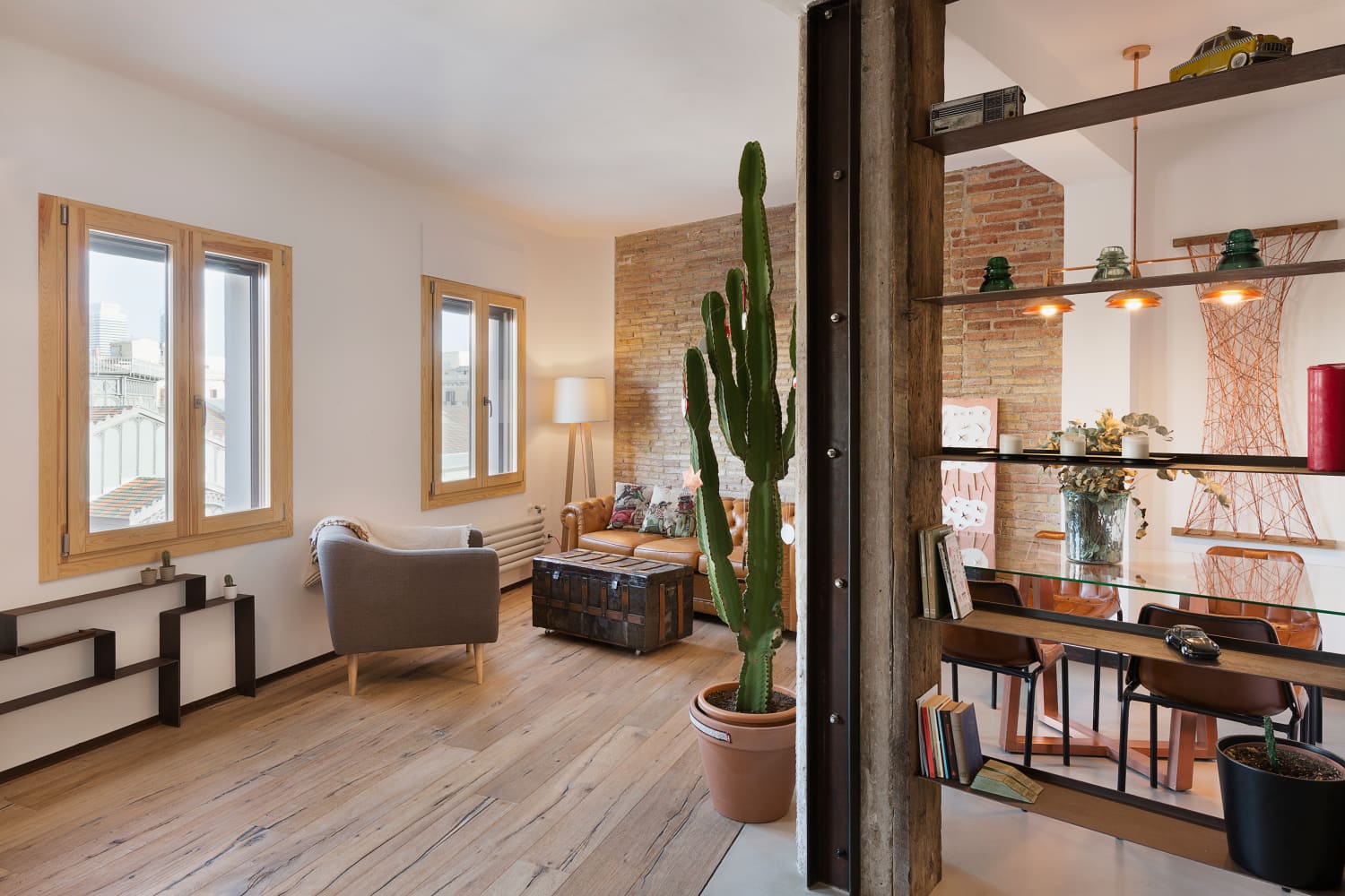 This industrial-inspired penthouse loft boasts chic interiors and ... - Remodeled Industrial Apartment With Penthouse View And Remote