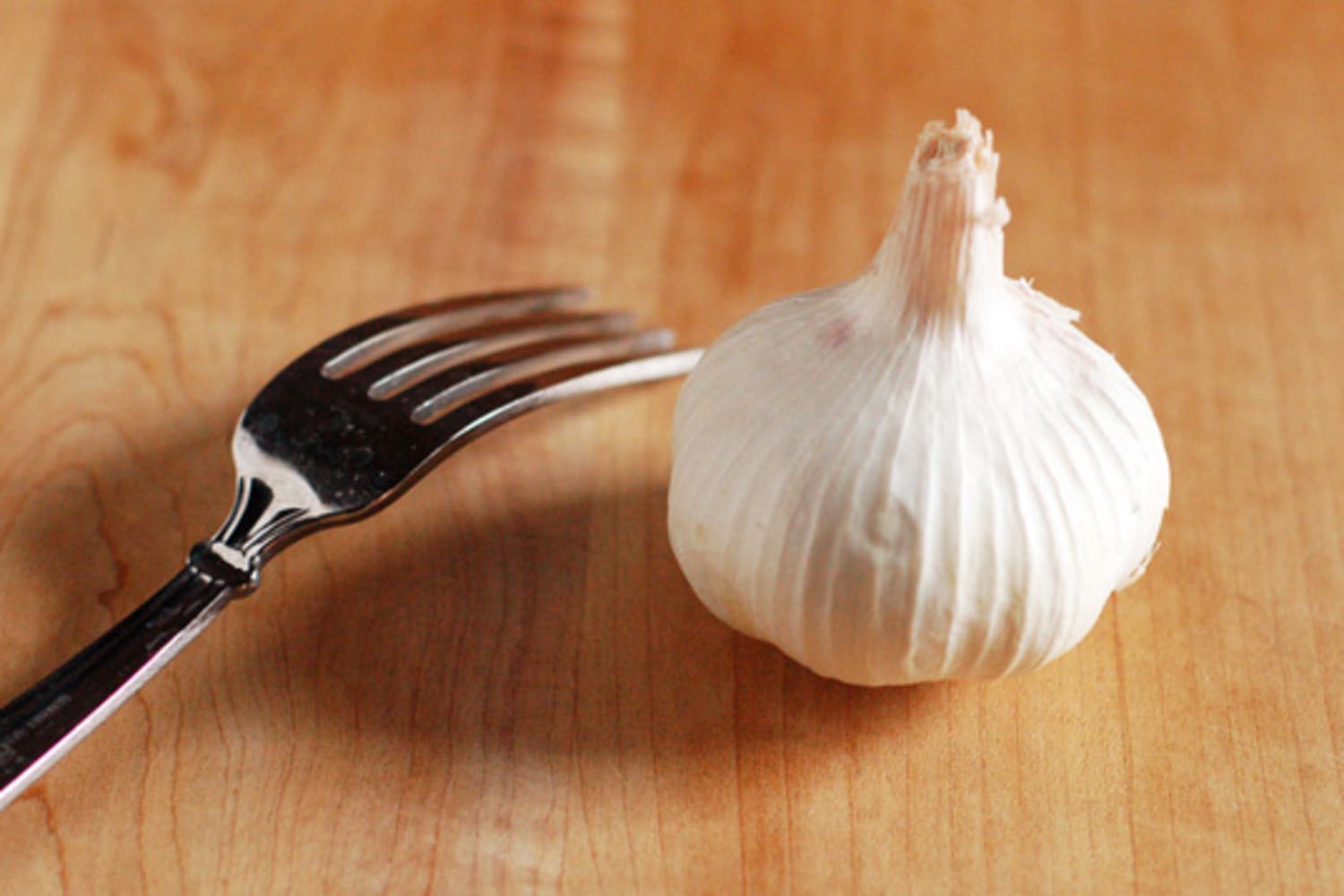 Quick and Easy Shortcut Mince Garlic with a Fork The Kitchn