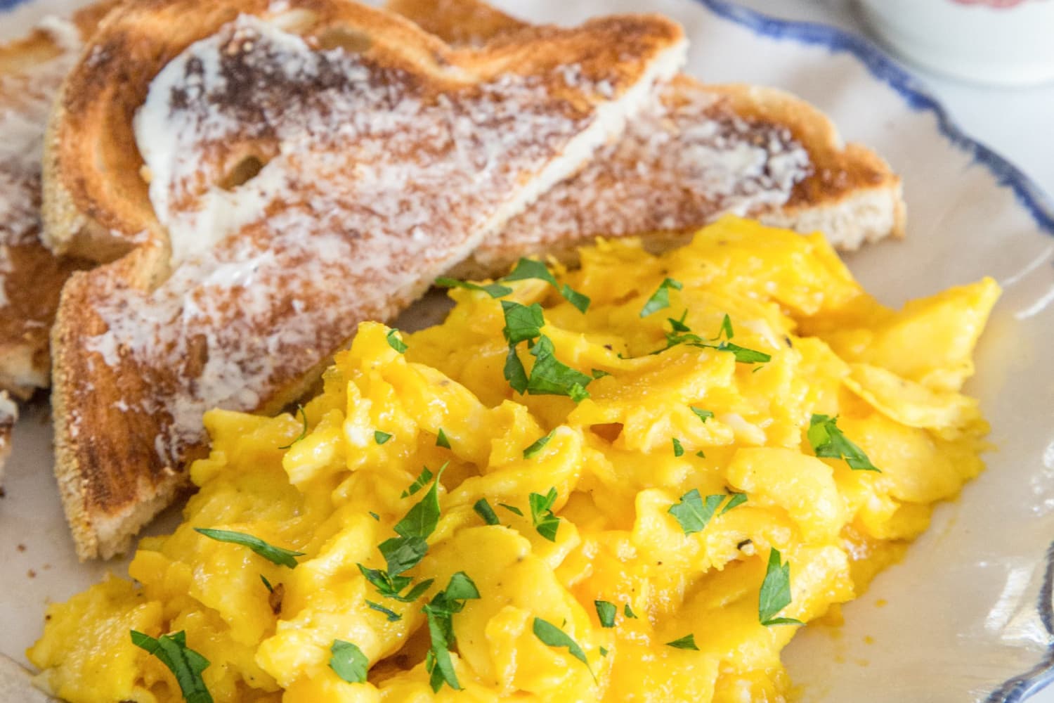 Scrambled eggs recipe soft creamy and slow cooked the kitchn