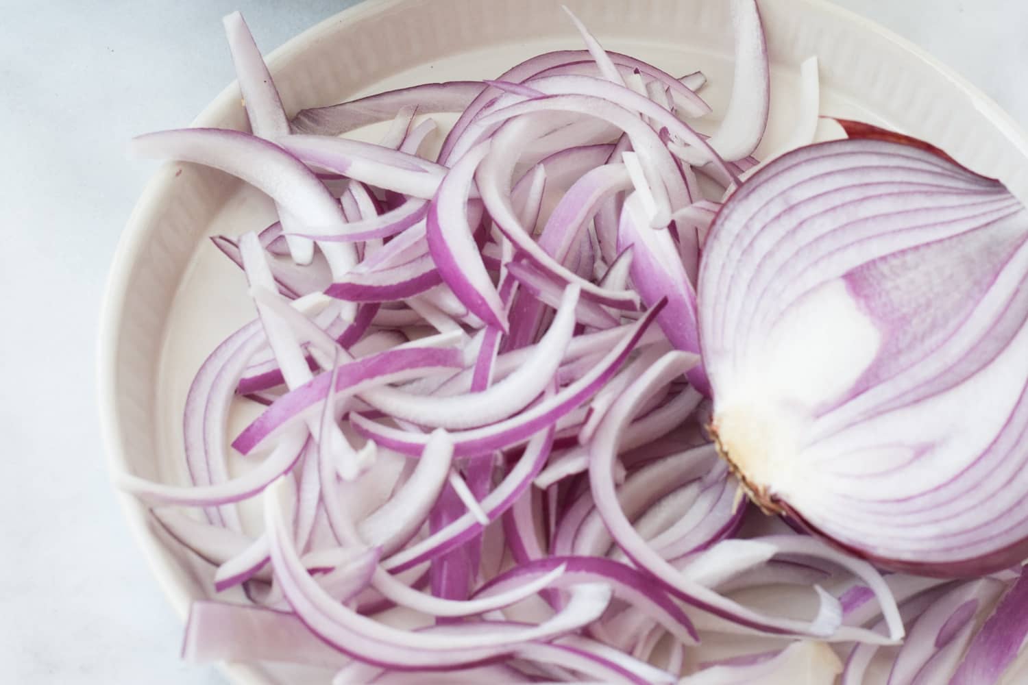 The Best Way to Tame the Taste of Raw Onions The Kitchn