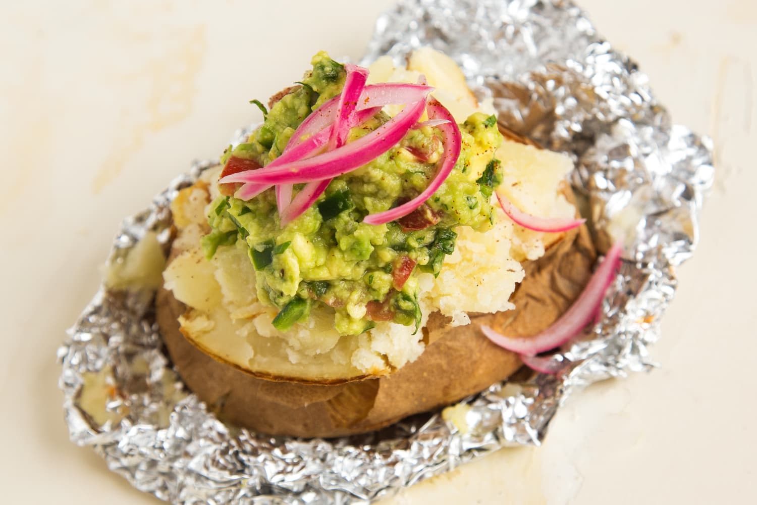 Baked Potato with Guacamole and Pickled Red Onions The Kitchn