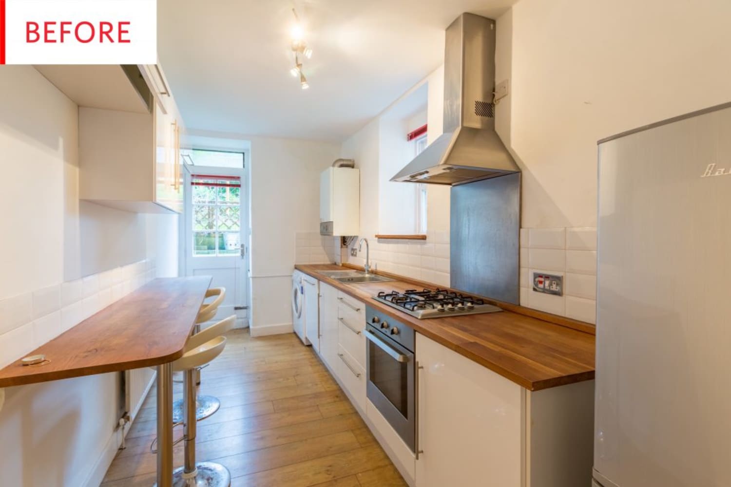 Before and After: Black Walls Bring Serious Drama to This $6,400 Kitchen Reno | Apartment Therapy