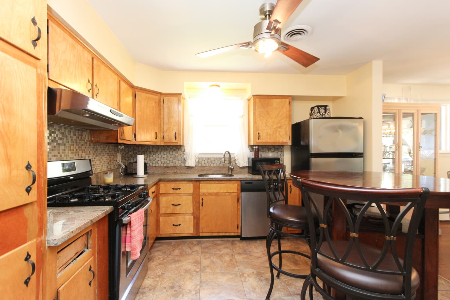Before & After: Taraji P. Henson Surprises Stepmom with a Brand-New Kitchen | Apartment Therapy