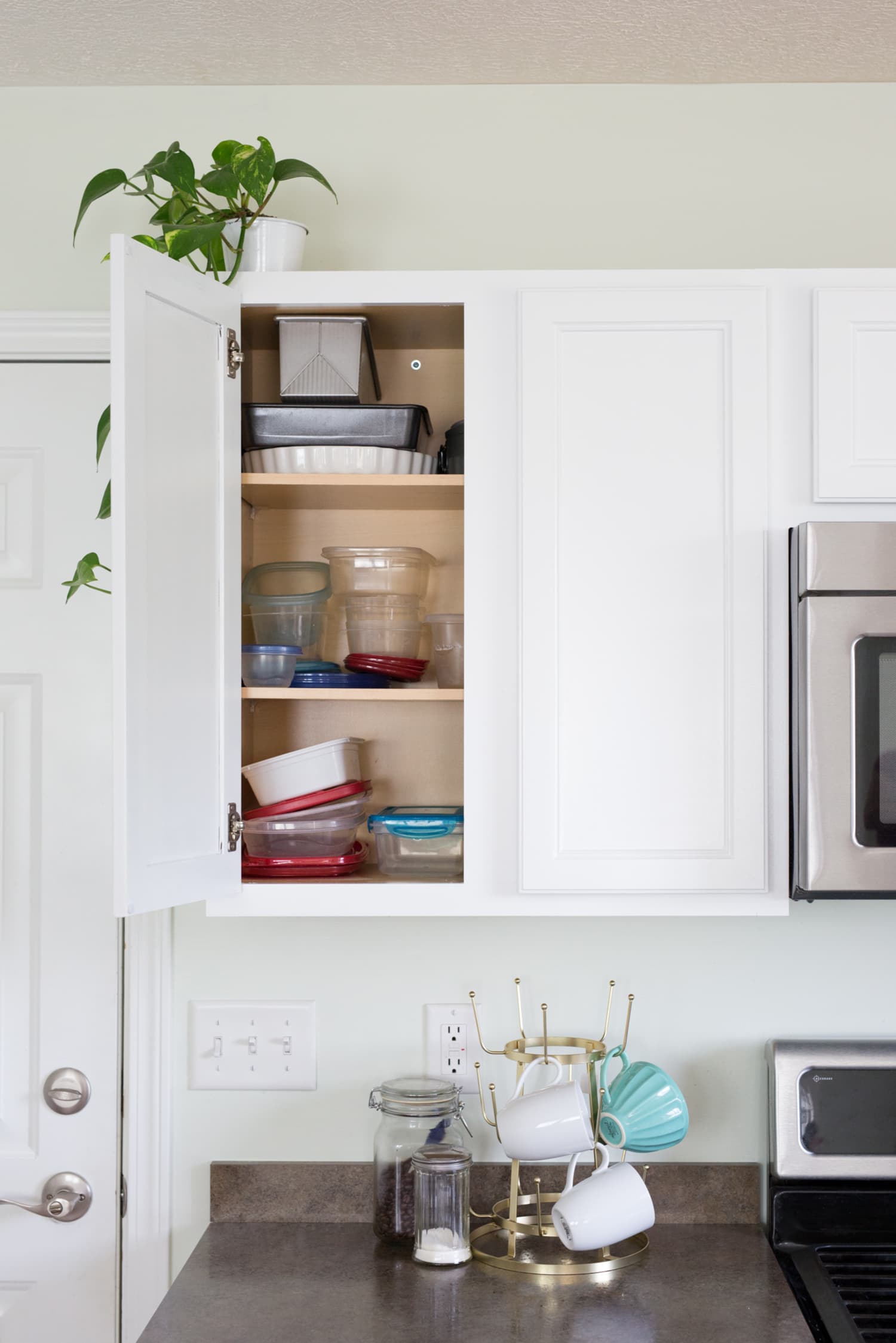 7 Tricks for Taming Your Cabinet of Food Storage Containers