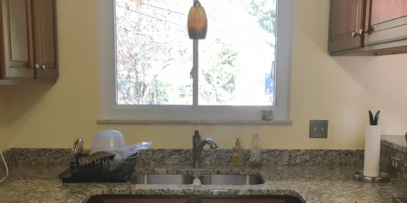 A Kitchen Remodel Gets Rid Of Granite Dark Wood Cabinets
