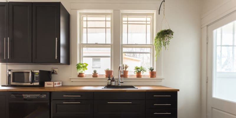 White cabinets black sink sale
