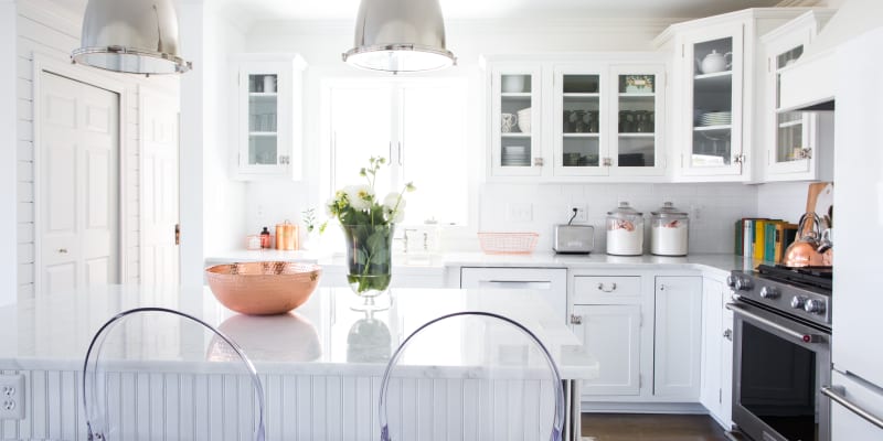 White cabinet with store frosted glass doors