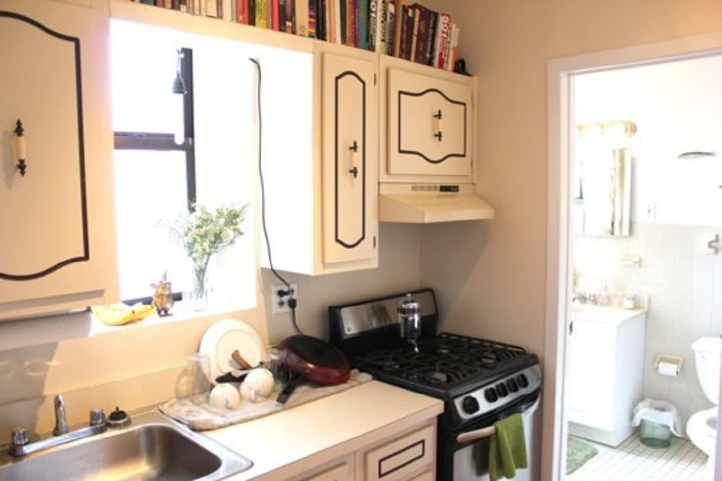 7 Things to Do with That Awkward Space Above the Cabinets ...