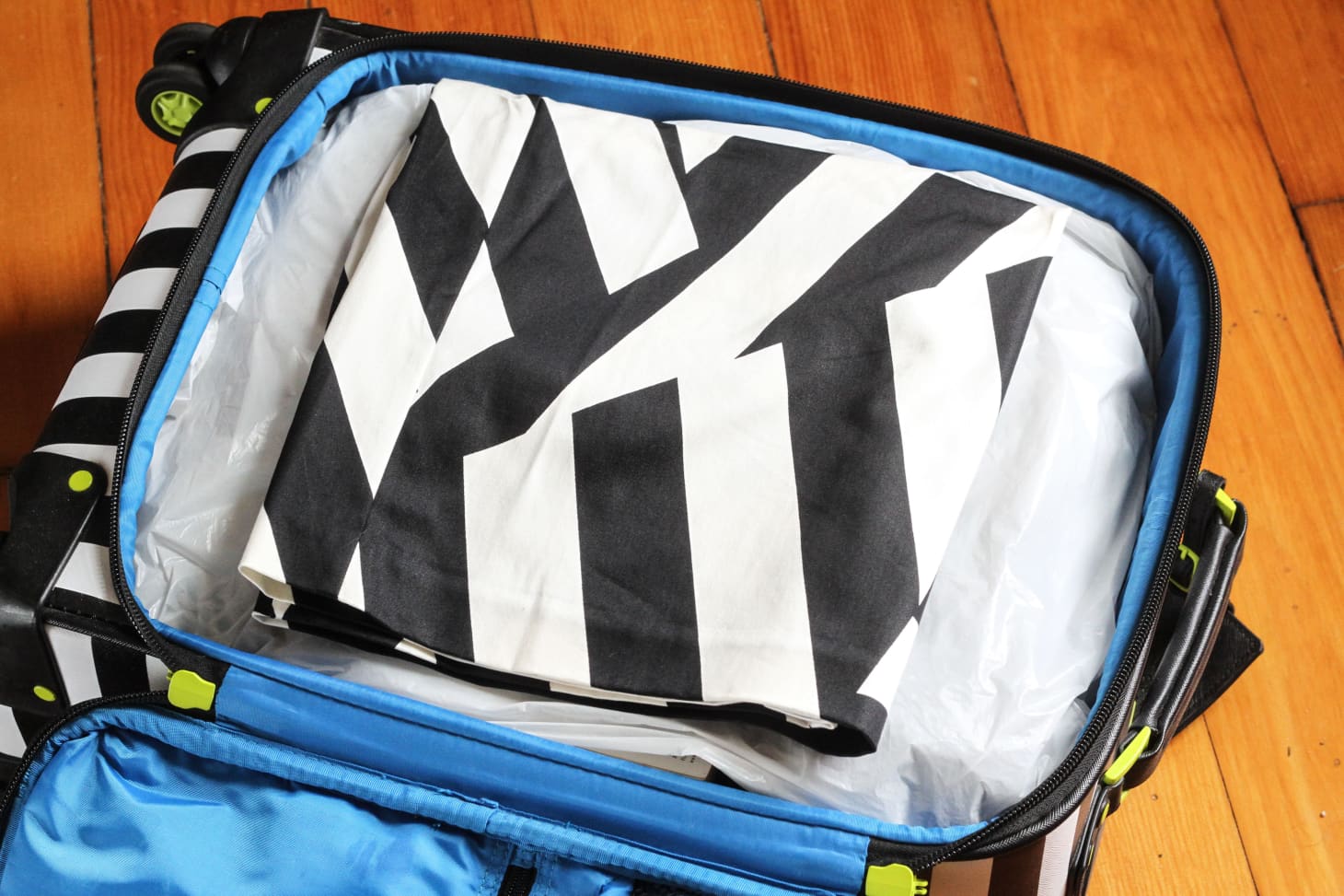 Tips & Tricks How To Pack a Suitcase Well Apartment Therapy