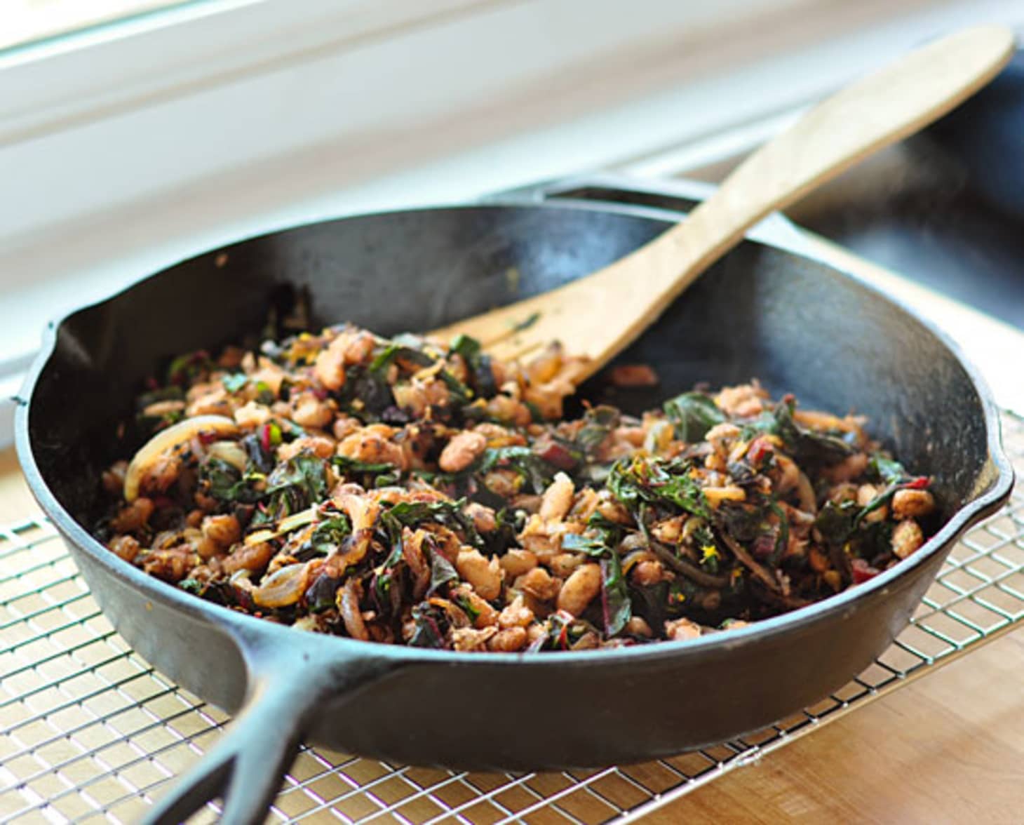 Recipe Crispy PanFried Beans with Wilted Greens Kitchn