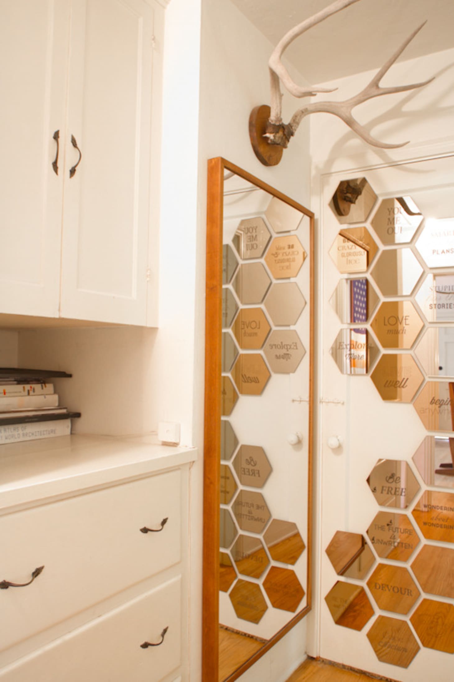 Ikea Art Ideas For Large Blank Walls Apartment Therapy Sean Sara S Minimal Americana Image Credit Apartment Therapy The Honeycomb Arrangement Of Honefoss Hexagonal Mirrors