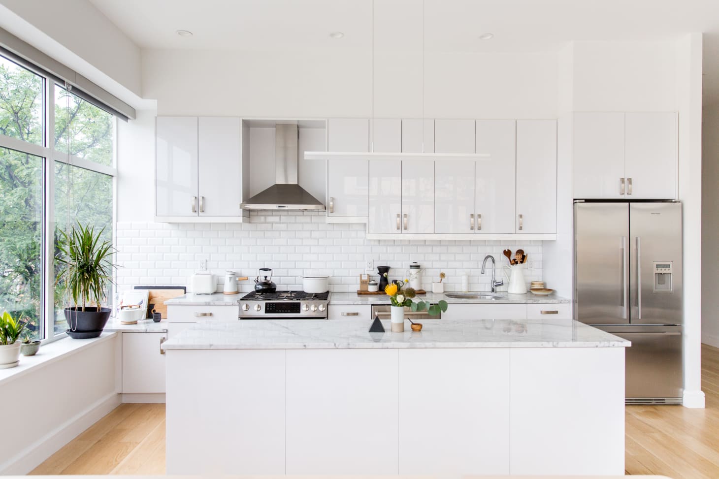 kitchens with decorative ceiling tiles in soffit area