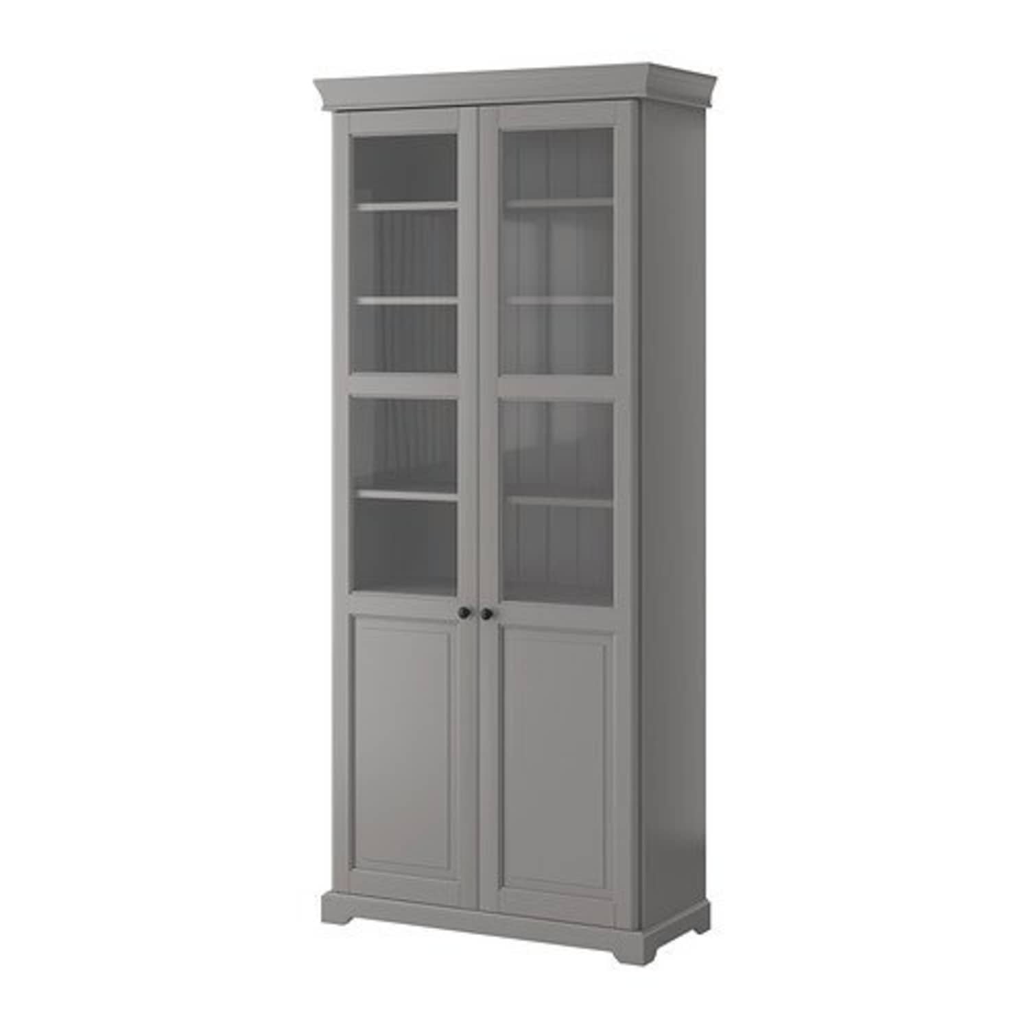Glass Bookcases Pretty Or Cluttered Apartment Therapy Glass Bookcases Pretty Or Cluttered