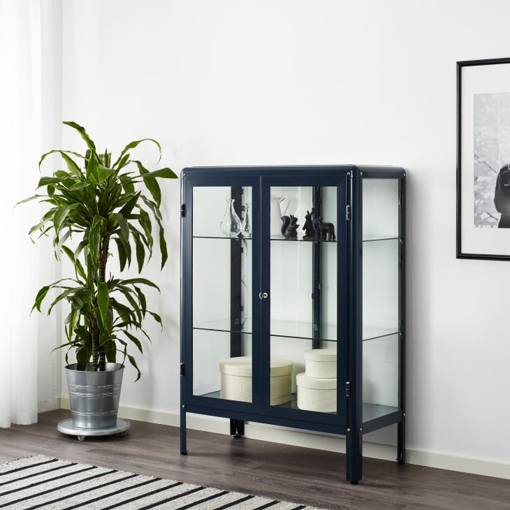 Short cabinet deals with glass doors