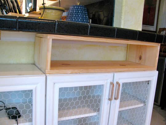 Cabinets under breakfast bar