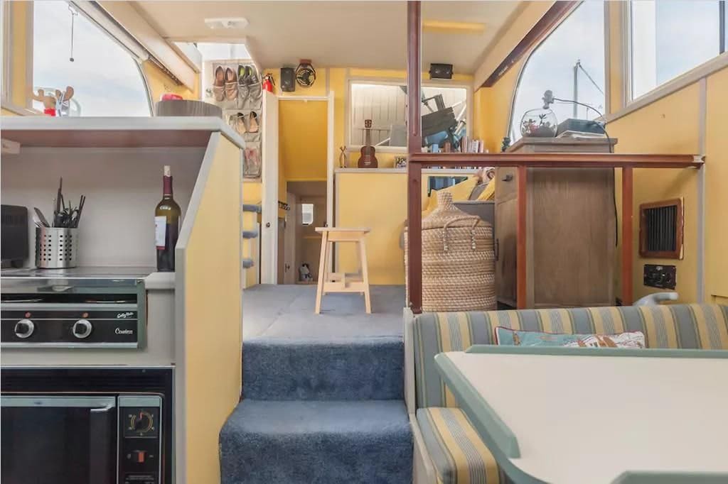 This Tiny Houseboat Packs A Lot Into 360 Square Feet 