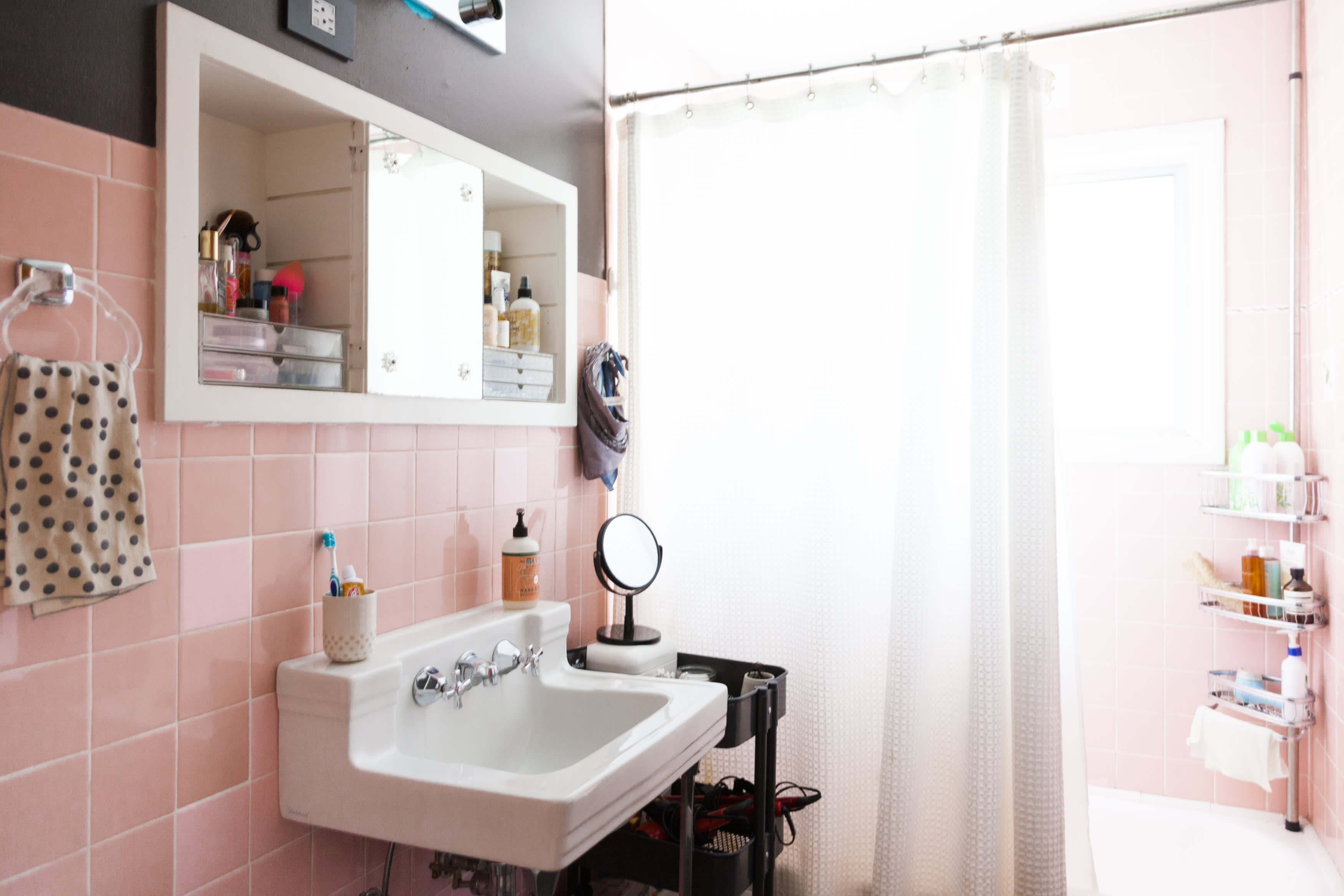 image of storing towels under bathroom sink