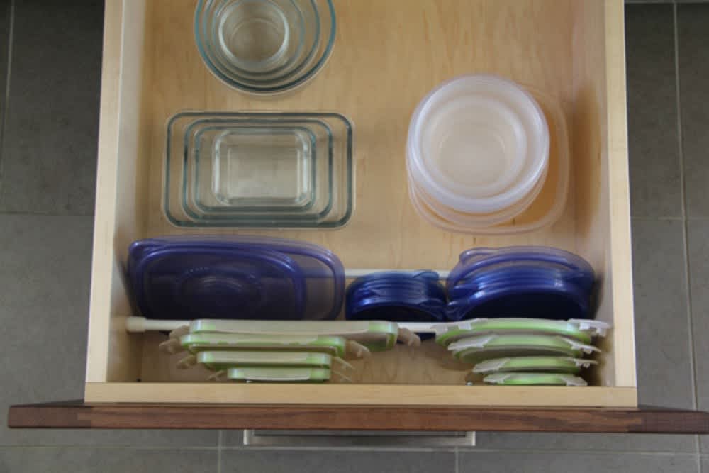 7 Clever Ways to Organize Tupperware and Food Storage Containers Apartment Therapy