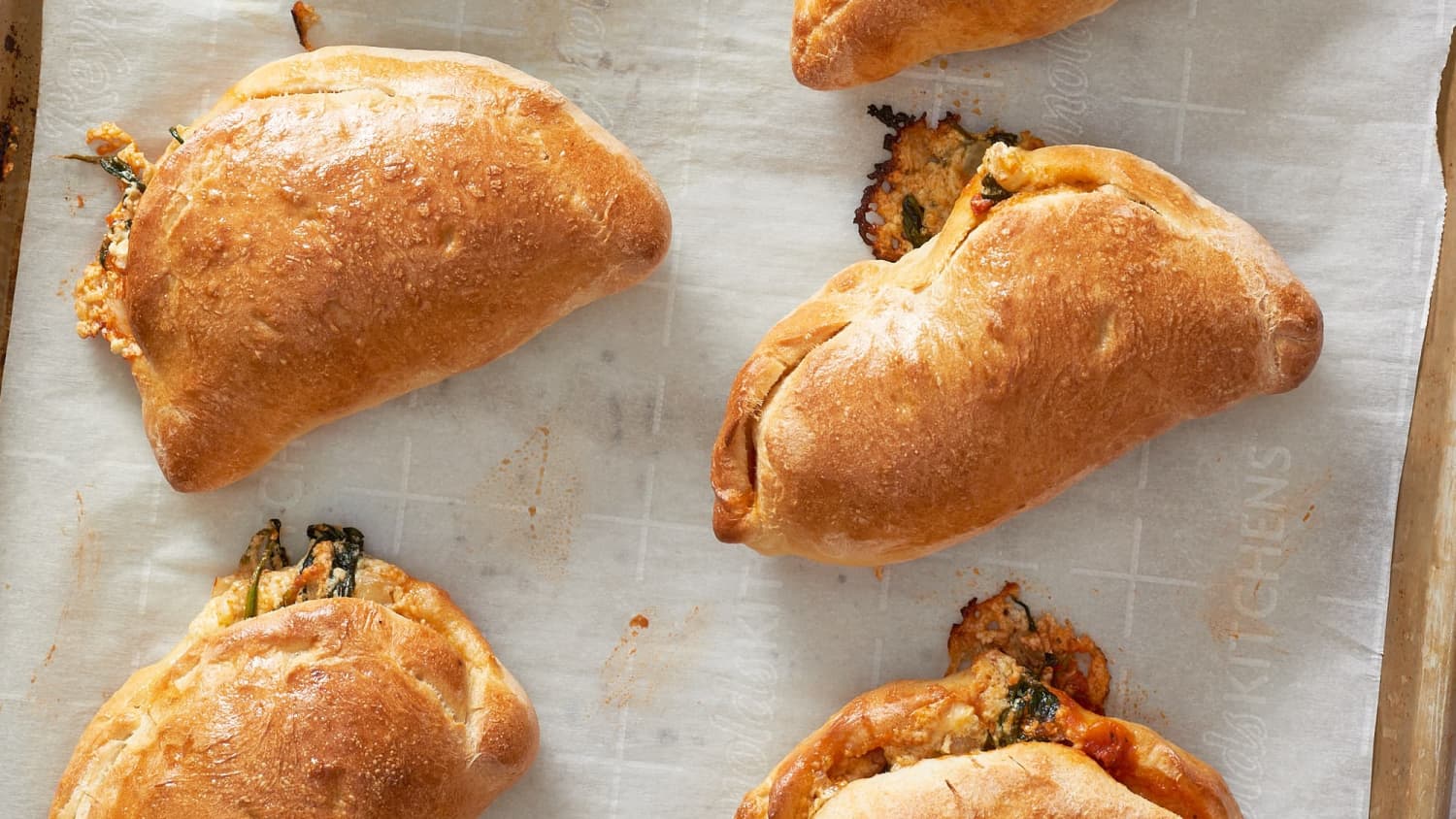 How To Make Calzones And Freeze Them For Later Kitchn Bake until the crust turns a rich golden brown, 12 to 15 minutes. how to make calzones