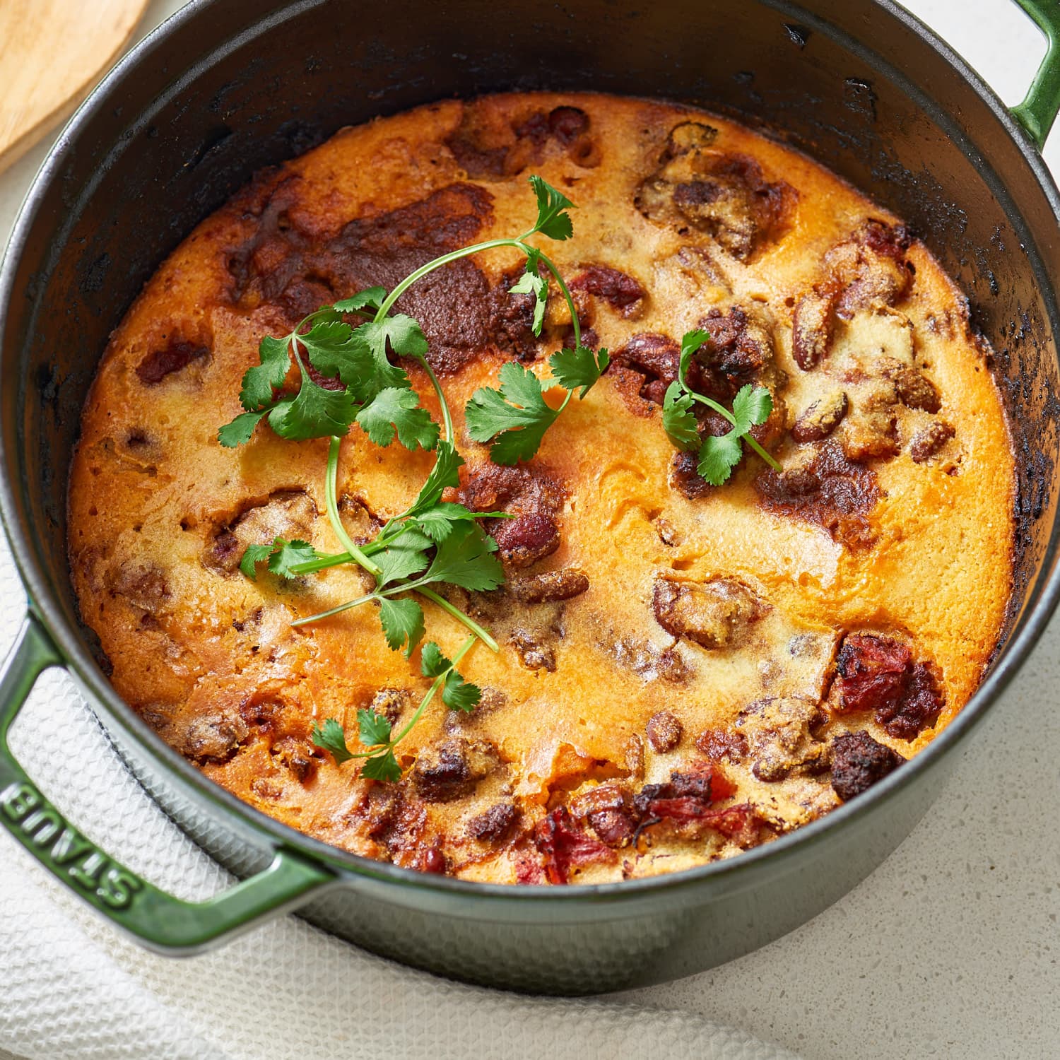 Recipe Chili Cornbread Casserole Kitchn Making dutch oven cornbread chili by familyspice.com. chili cornbread casserole