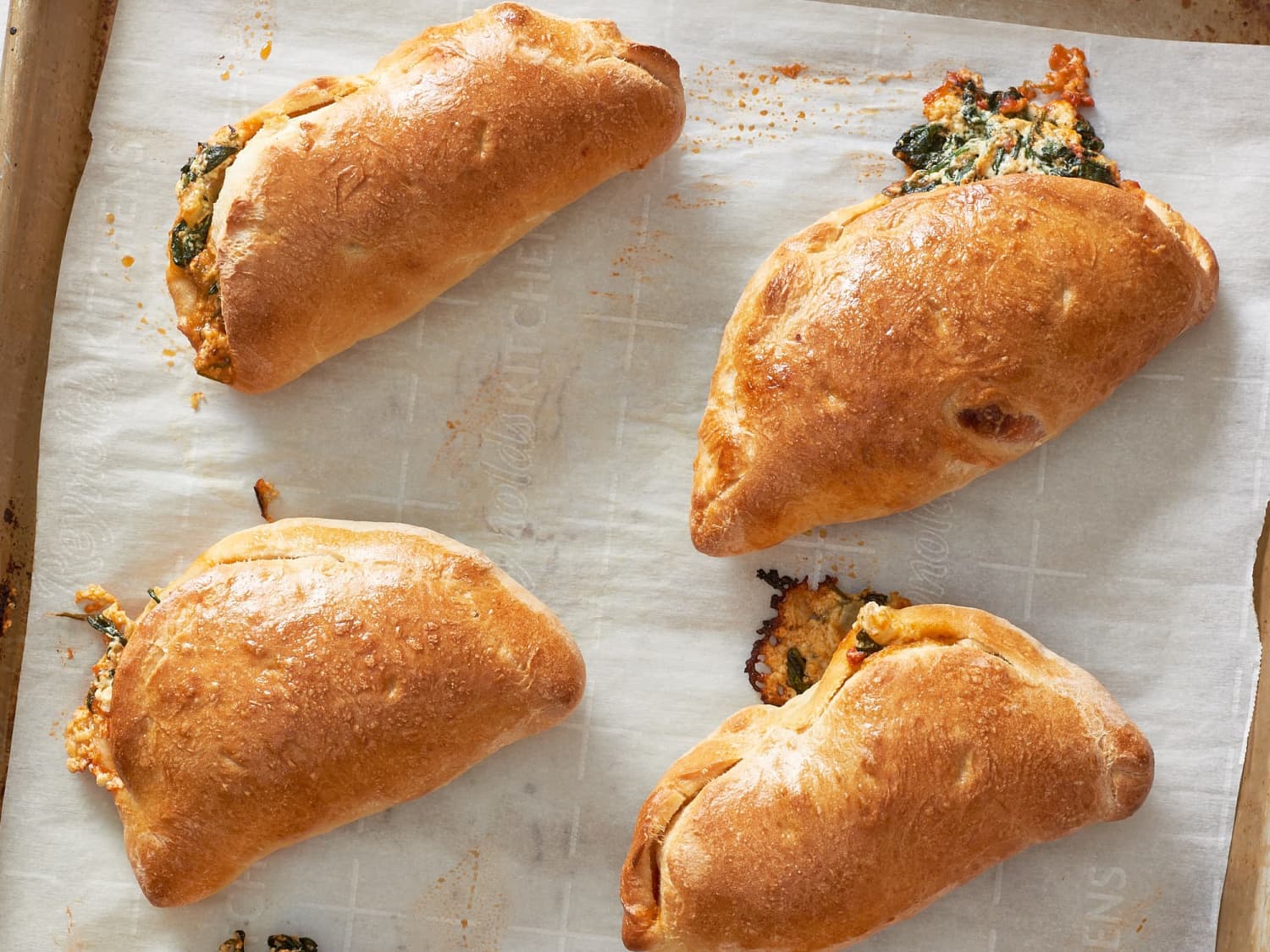 How To Make Calzones And Freeze Them For Later Kitchn Bake the calzone for 15 to 18 minutes or until it's hot in the centre and the crust becomes golden brown. how to make calzones