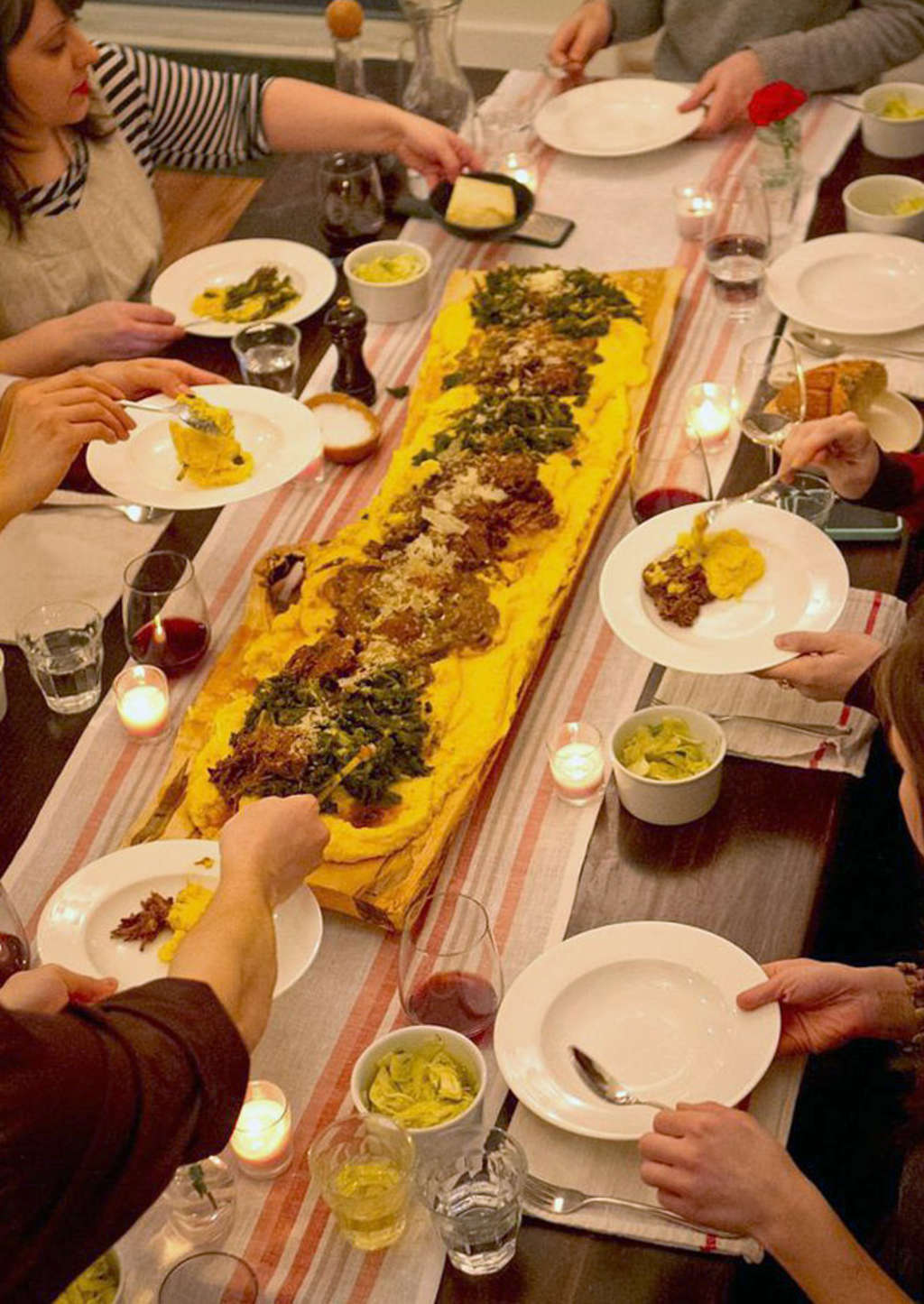 Family Dinner Party - How couples deal with splitting the holidays | Well+Good : Decorate with tiki torches and serve roasted pig, rice, blended beverages and pineapple upside down cake for dessert.