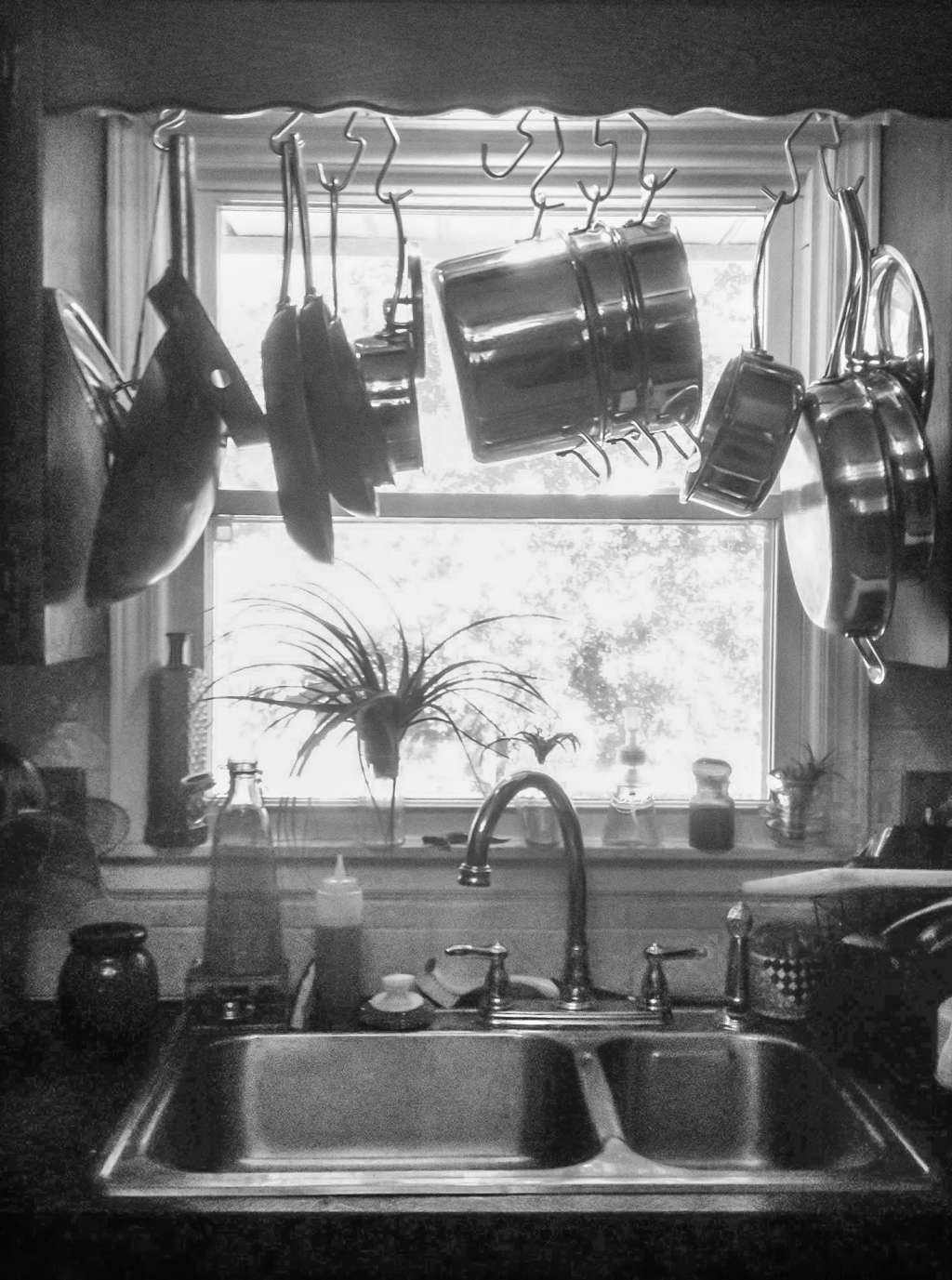Hang Your Pot Rack Over the Sink and Let Your Pans Drip Dry Kitchn