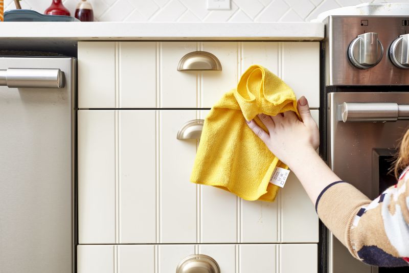 How To Get Sticky Cooking Grease Off Cabinet Doors | Kitchn