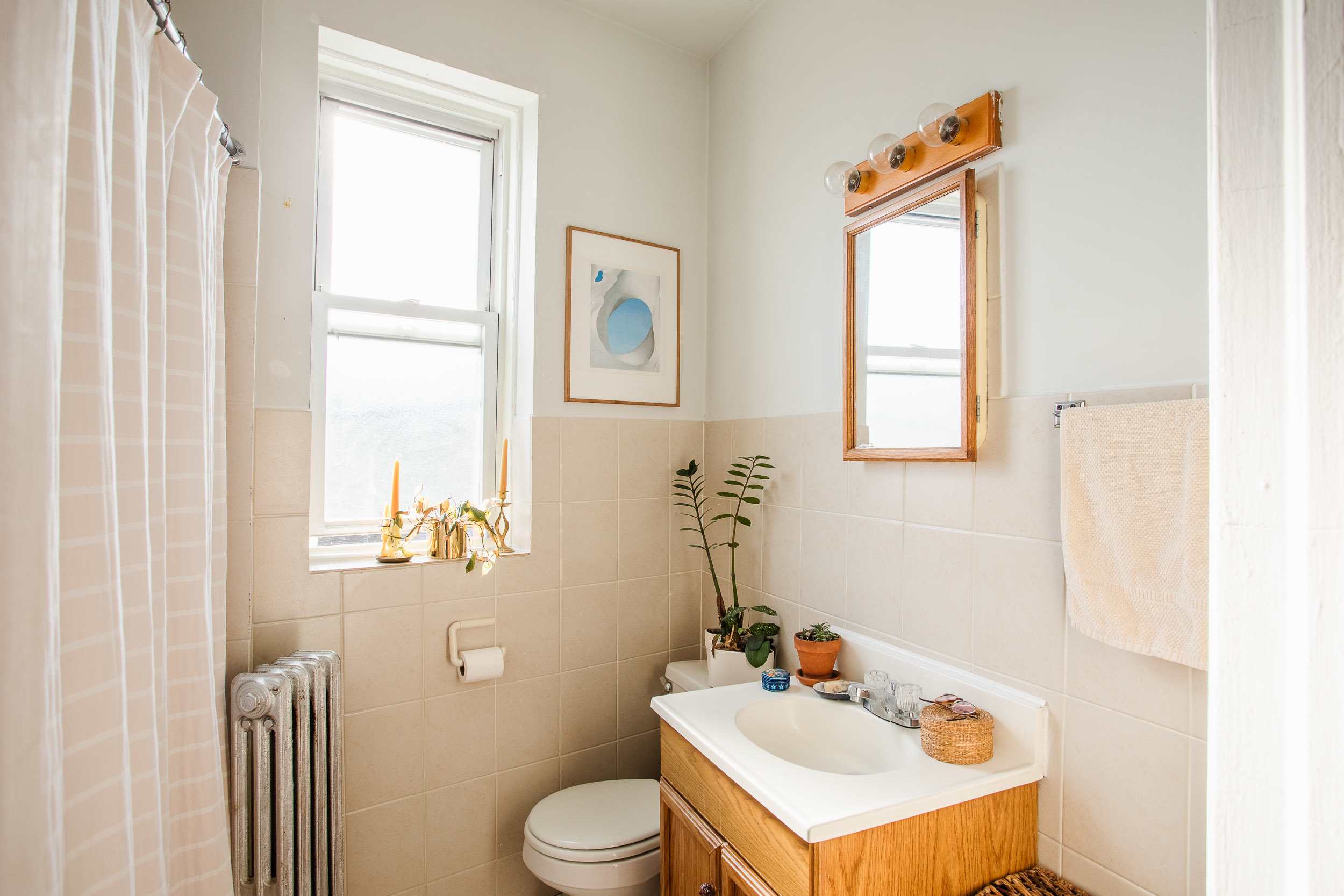 The Shockingly Gorgeous Reason You Should Use a Sheet in Your Bathroom