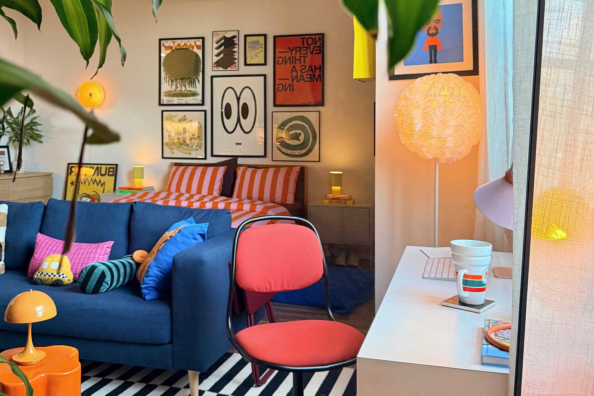 A 600-Square-Foot NYC Rental Loft Pairs Exposed Ductwork with Pink Stripes