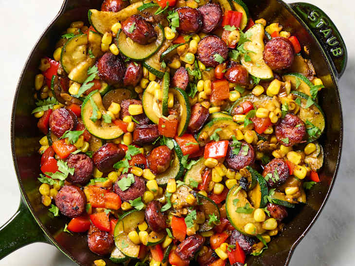https://cdn.apartmenttherapy.info/image/upload/f_auto%2Cq_auto%3Aeco%2Cc_fit%2Cw_730%2Ch_548/tk%2Fphoto%2F2025%2F05-2025%2F2025-05-cajun-sausage-summer-veg-skillet%2Fcajun-sausage-summer-veg-skillet-103