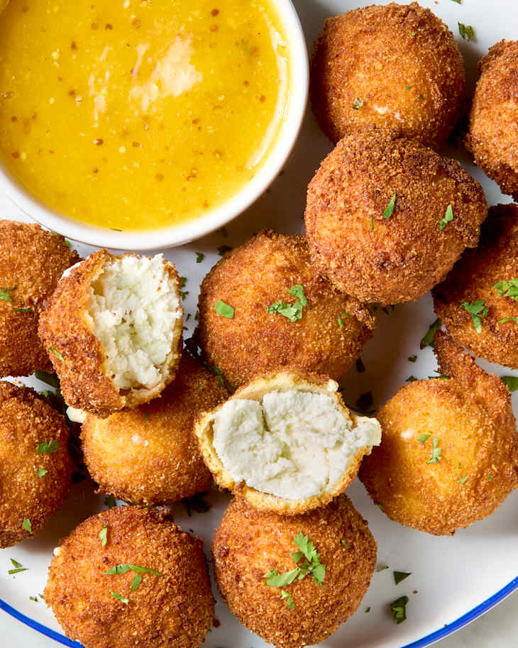 https://cdn.apartmenttherapy.info/image/upload/f_auto%2Cq_auto%3Aeco%2Cw_730/k%2FPhoto%2FRecipes%2F2024-01-fried-goat-cheese-balls%2Ffried-goat-cheese-balls-332