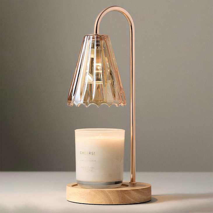 Amber Bloom candle warmer lamp with a scalloped glass shade and pale candle jar