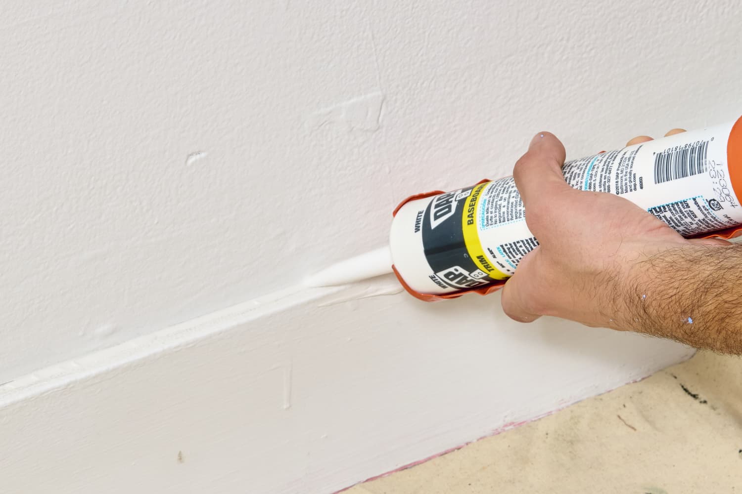 How to load a caulk gun like a pro according to a handyman apartment