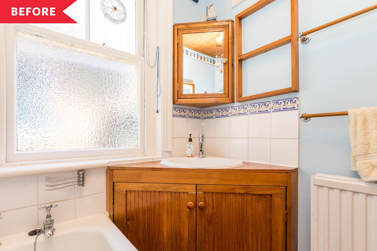 Leftover Paint Was the Secret to This $100 Bathroom Redo