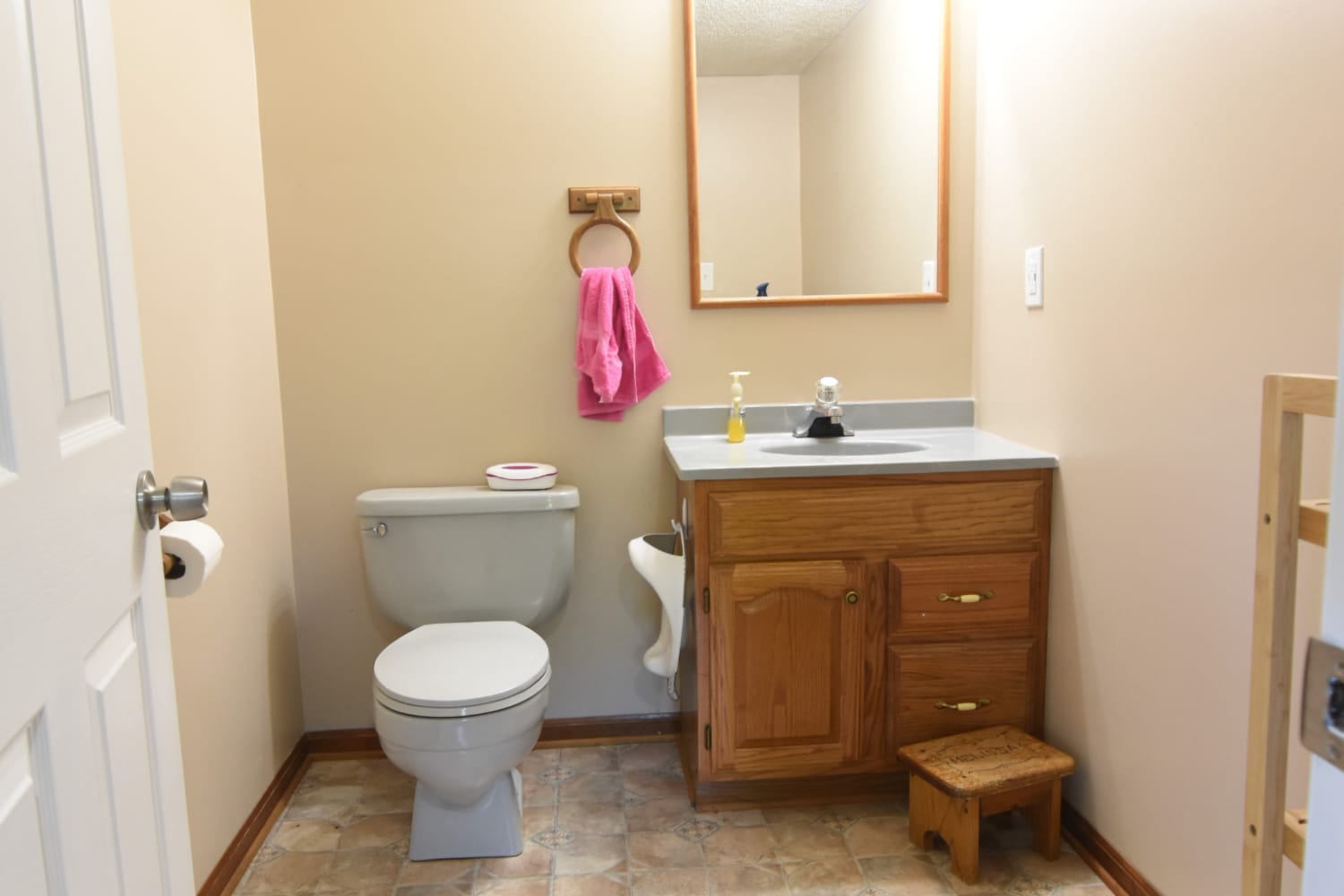 Peel-And-Stick Tile Transformed This Dated Builder-Grade Bath for Only $200