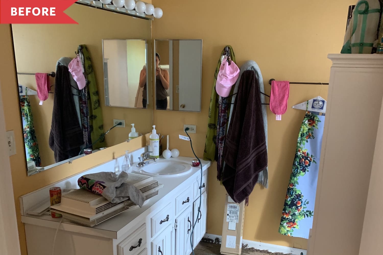 This Dated Bathroom Feels Warm and High-End Thanks to Smart DIY Fixes