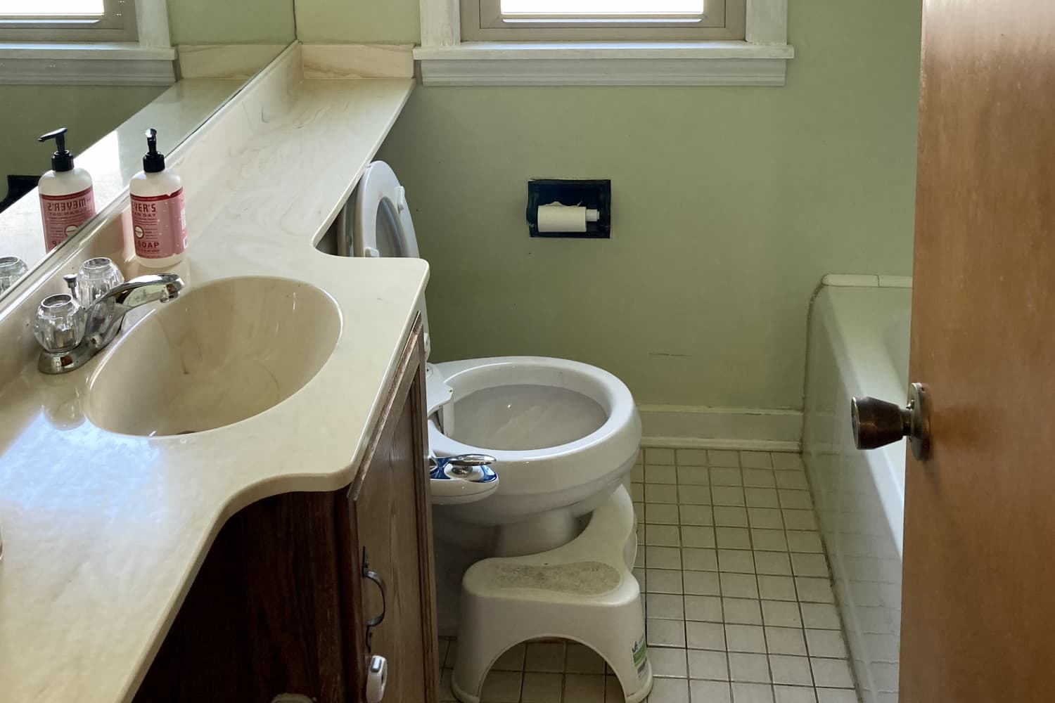 A "Dingy" Bathroom Got a Modern Pink Redo That's Now Super Functional