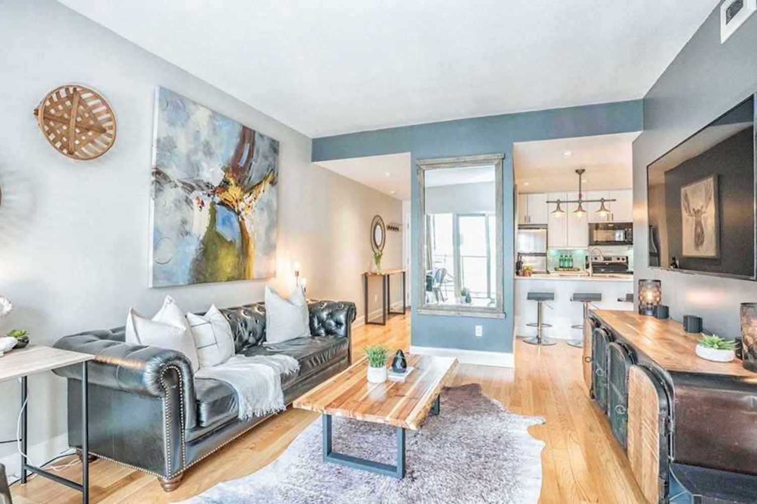 A "Cold and Gray" Living Room Transforms with the Coolest DIY Fireplace